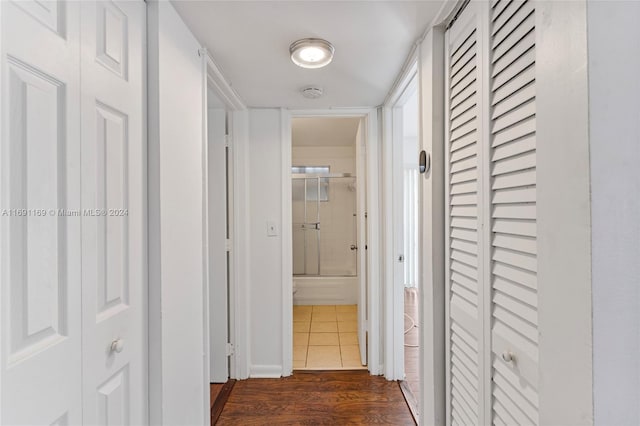 hall featuring dark wood-type flooring