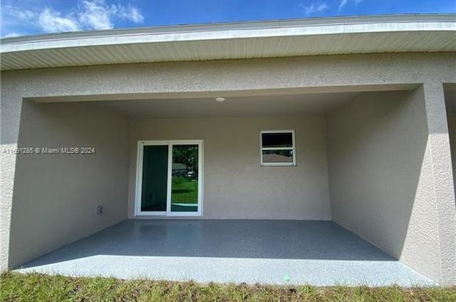 exterior space with a patio area