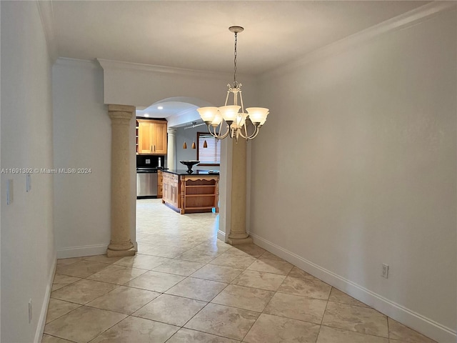 interior space with an inviting chandelier, ornate columns, and crown molding