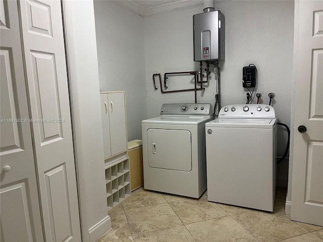 washroom featuring water heater, independent washer and dryer, light tile patterned floors, and crown molding