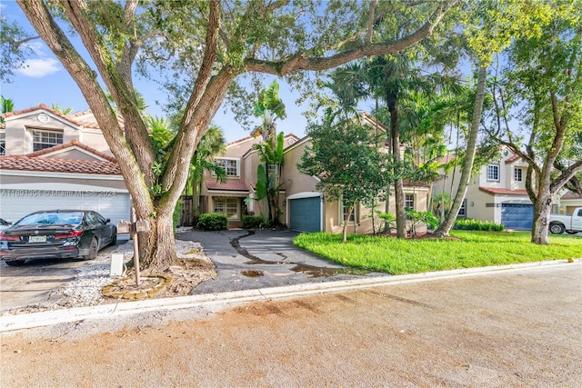 view of front of property featuring a garage