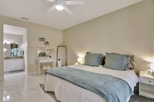 bedroom with sink and ceiling fan