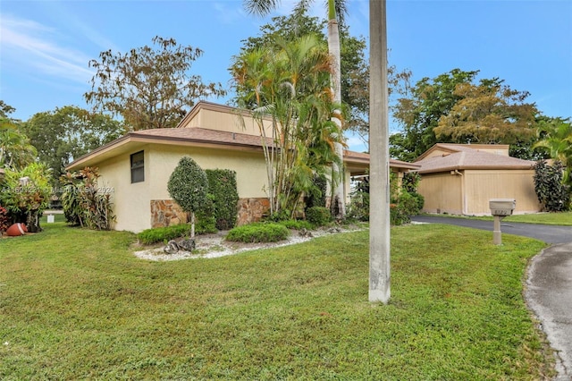 exterior space with a front lawn