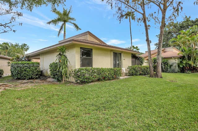 exterior space with a front lawn