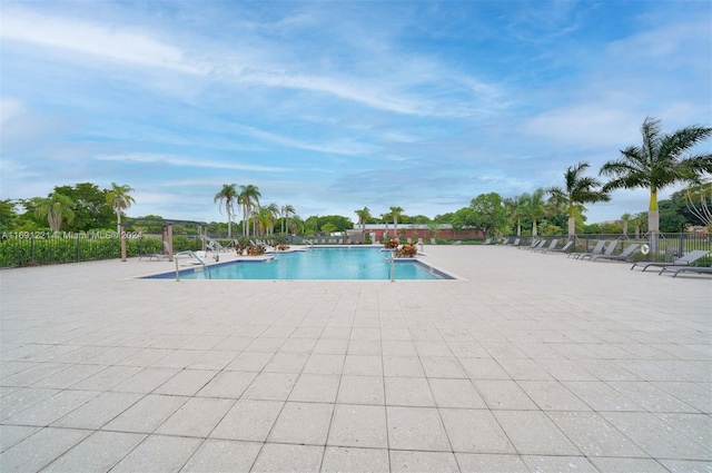 view of pool featuring a patio