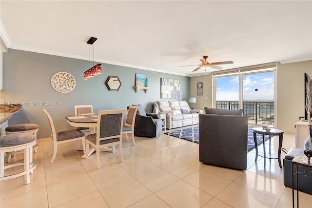 tiled living room with ornamental molding, ceiling fan, and floor to ceiling windows