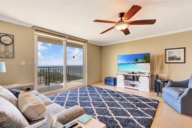 living room featuring ceiling fan, light tile patterned floors, and crown molding