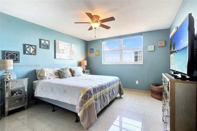 bedroom with light tile patterned flooring and ceiling fan