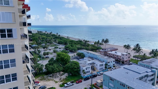 bird's eye view with a beach view and a water view