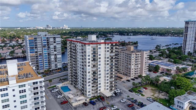 birds eye view of property with a water view