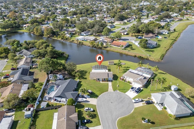 bird's eye view with a water view