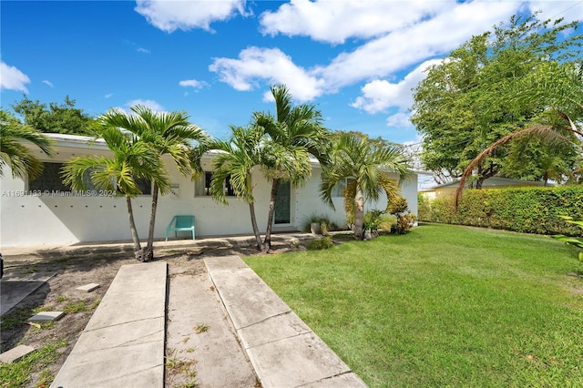 exterior space featuring a front yard