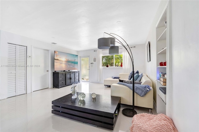 living room featuring light tile patterned floors