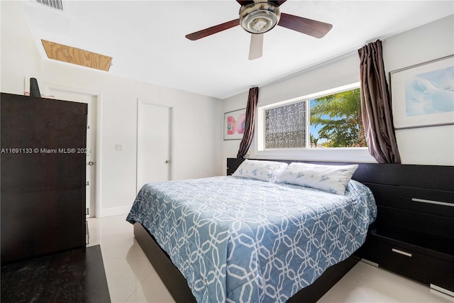 bedroom featuring ceiling fan and light tile patterned floors