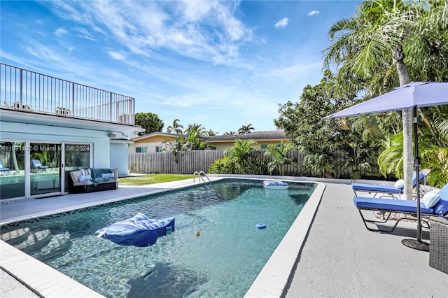 view of swimming pool featuring an outdoor hangout area and a patio