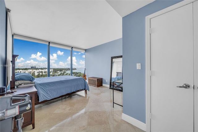 bedroom with light tile patterned floors