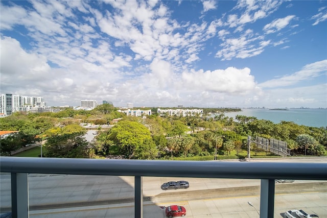 balcony featuring a water view