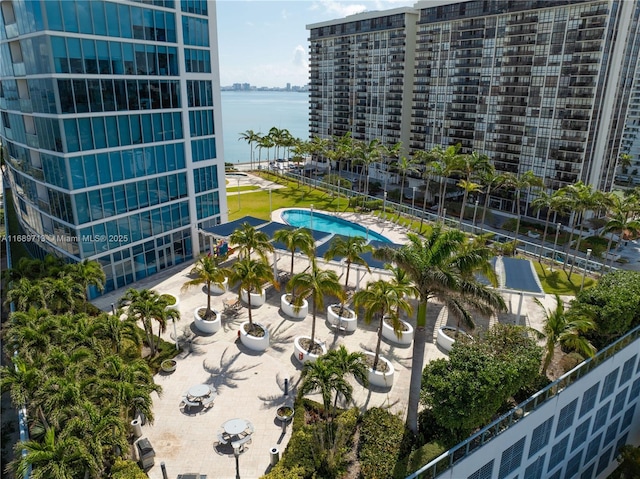 view of pool with a water view