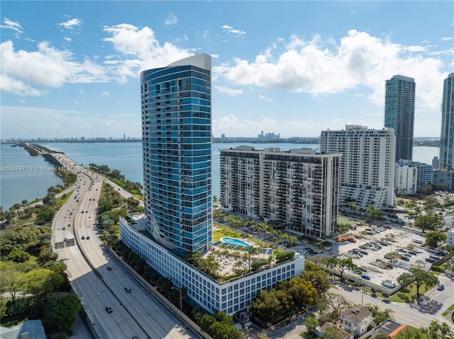 birds eye view of property featuring a water view