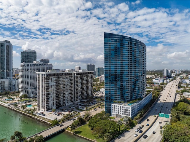 property's view of city featuring a water view