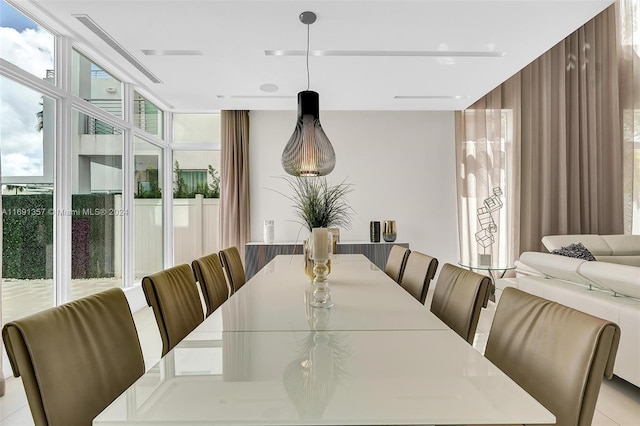 dining room featuring light tile patterned flooring