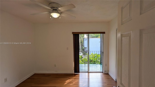 unfurnished room featuring light hardwood / wood-style flooring and ceiling fan