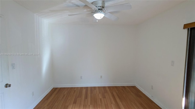 unfurnished room with wood-type flooring and ceiling fan