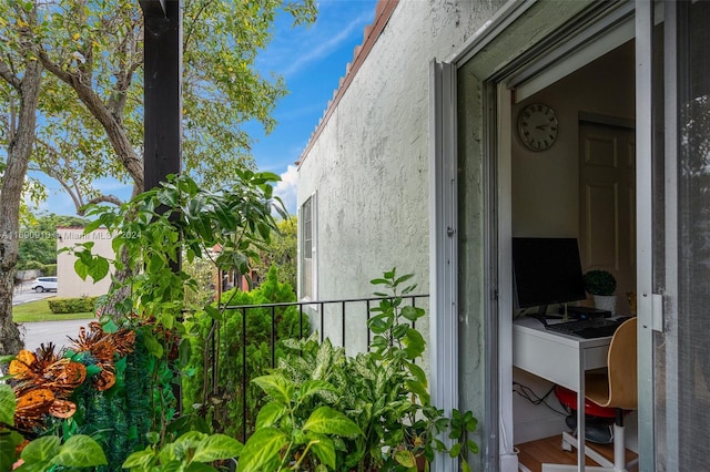 view of property exterior featuring a balcony