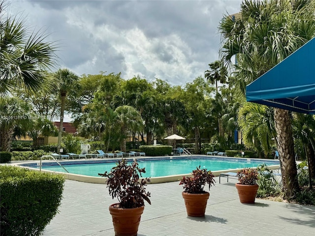 community pool featuring a patio