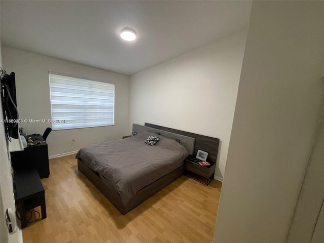 bedroom featuring light hardwood / wood-style floors