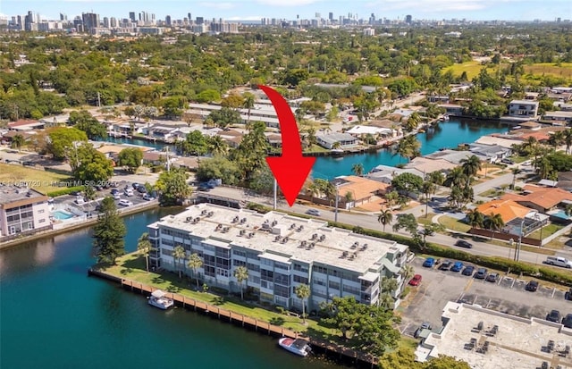 birds eye view of property featuring a water view