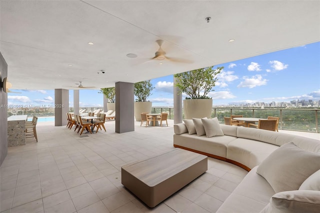 view of patio featuring an outdoor hangout area and ceiling fan