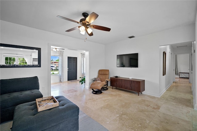 living room with ceiling fan