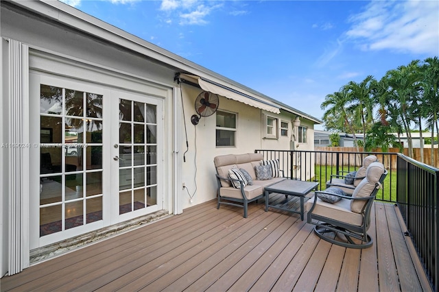 wooden deck with outdoor lounge area