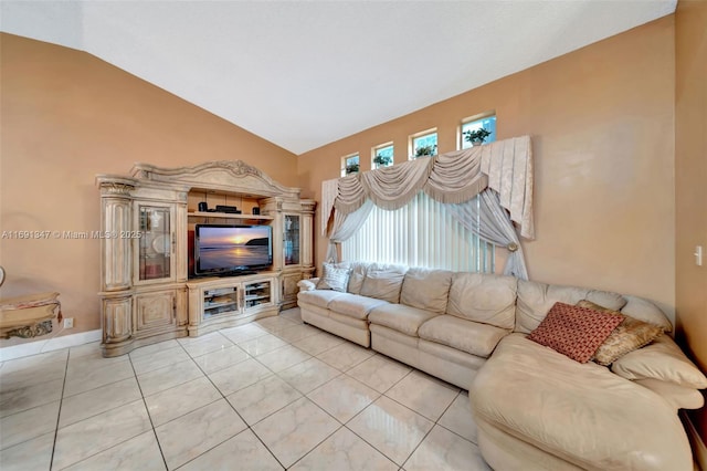 tiled living room with vaulted ceiling