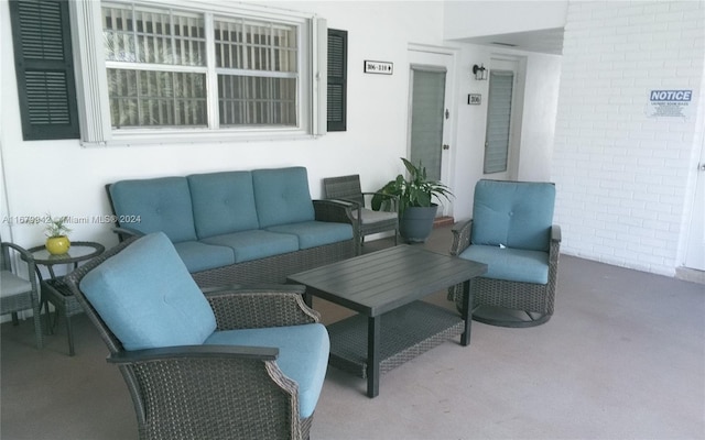 living room featuring carpet floors