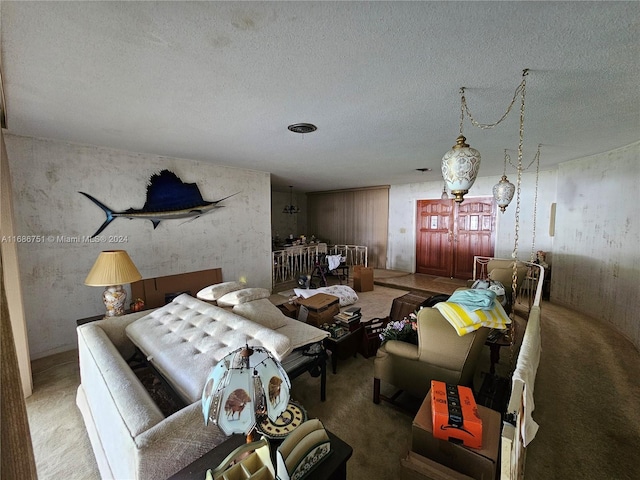 interior space featuring a textured ceiling and carpet