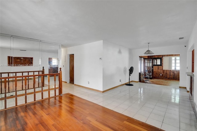 unfurnished room with light hardwood / wood-style flooring