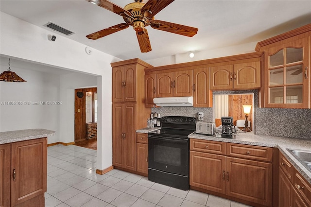 kitchen with black range with electric cooktop, tasteful backsplash, light tile patterned floors, and ceiling fan