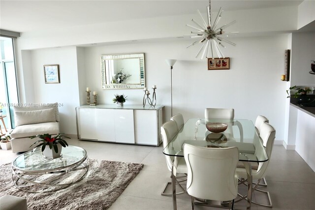 dining area featuring a chandelier