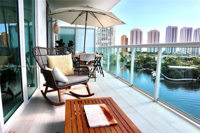 balcony featuring a water view