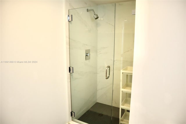 bathroom with an enclosed shower