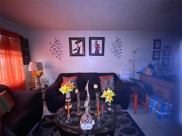 living room with tile patterned floors