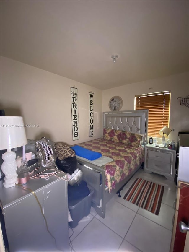 bedroom featuring tile patterned floors