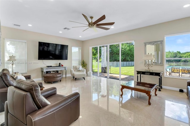 living room featuring ceiling fan