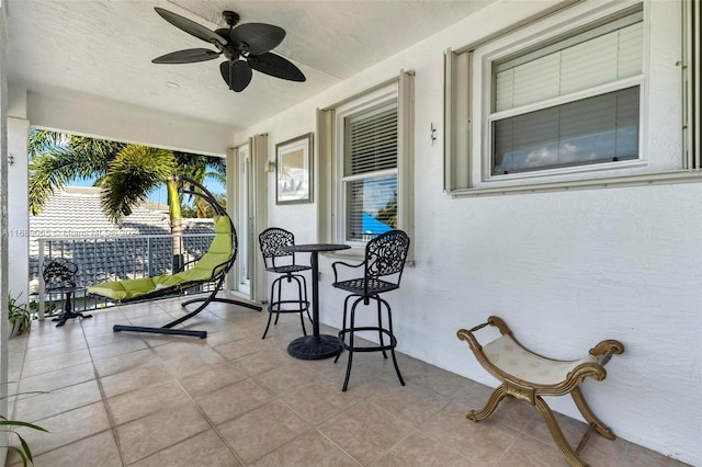 view of patio with ceiling fan