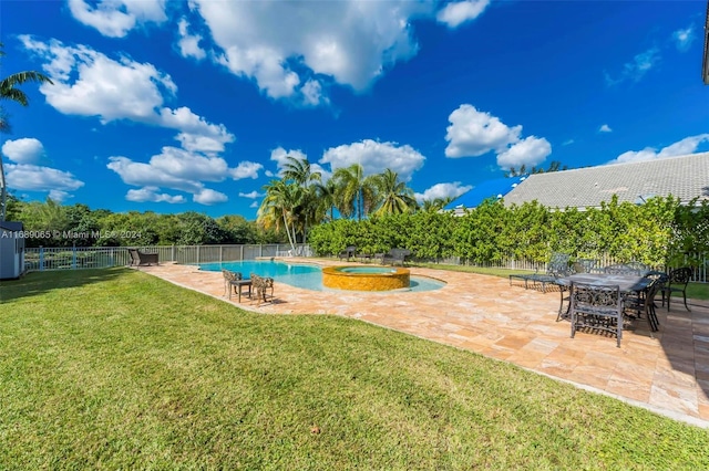 view of pool featuring a lawn, an in ground hot tub, and a patio