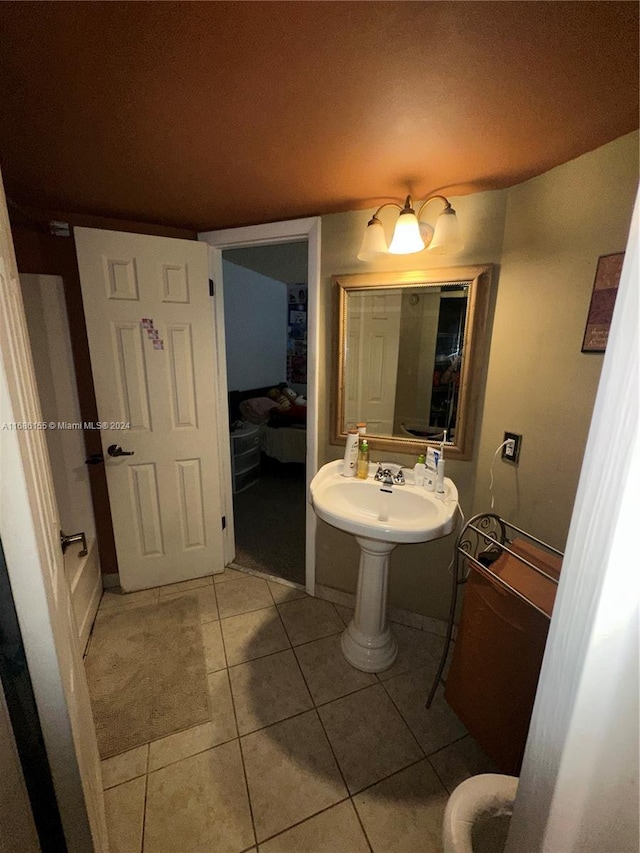 bathroom with sink and tile patterned floors