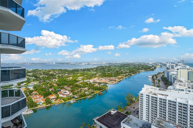 birds eye view of property featuring a water view