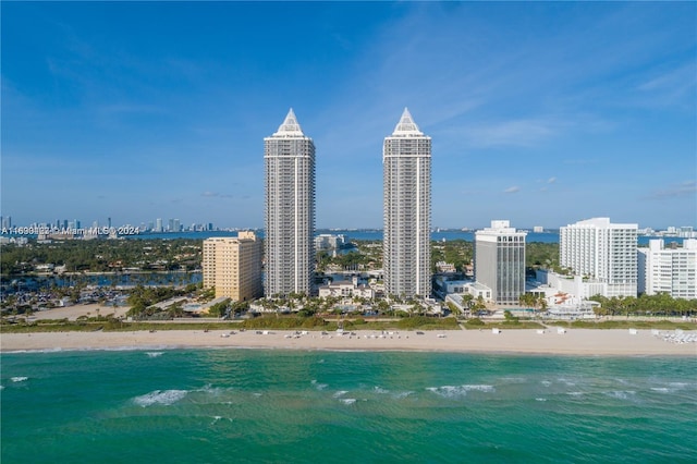 aerial view with a view of the beach and a water view